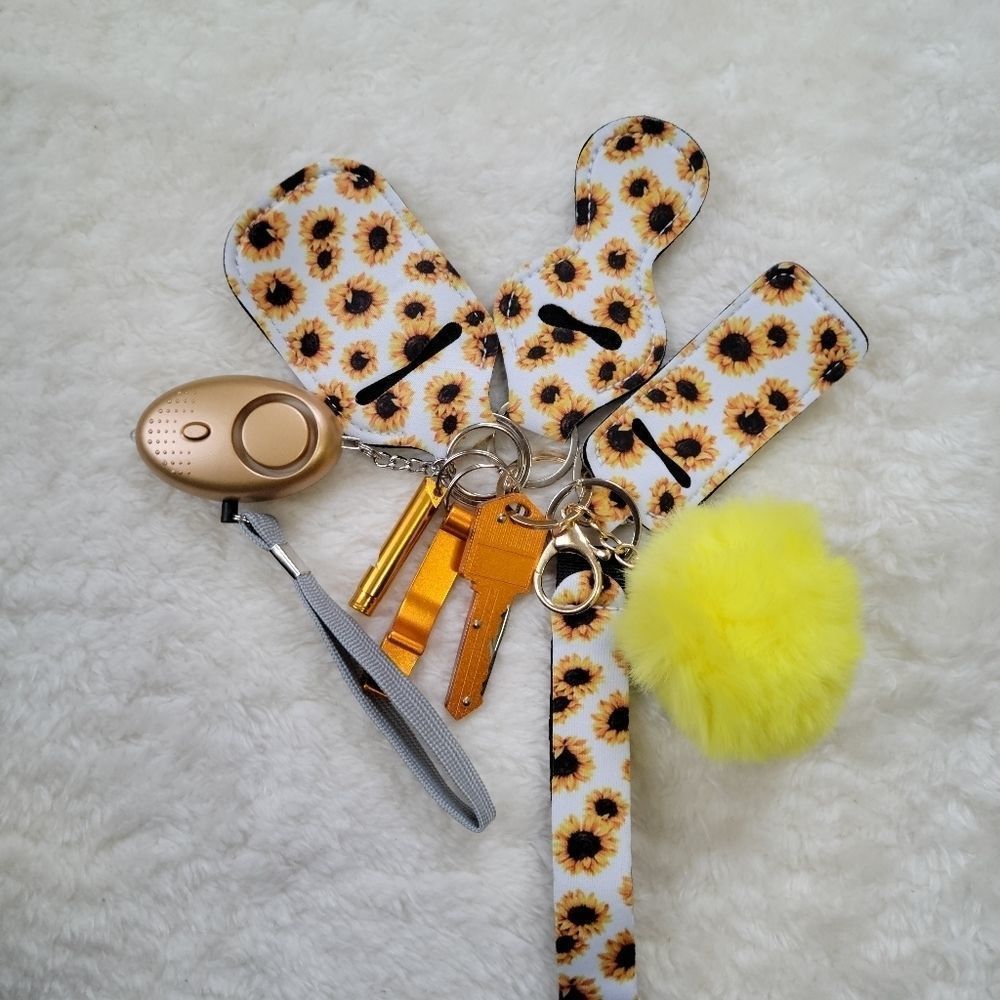 9 piece Self-defense Keychains Set- daisies design